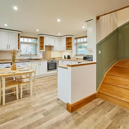 Host & - Fawcett Casa de Férias